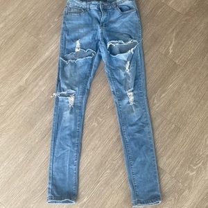 Distressed denim pants